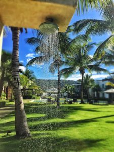 Beachside showers at Sublime Samana make it simple to rinse the sand from your toes before heading to the stunning pool